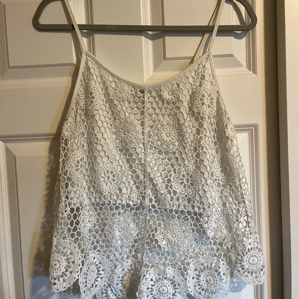 Like new summer top..worn only a few times. Smoke free home.